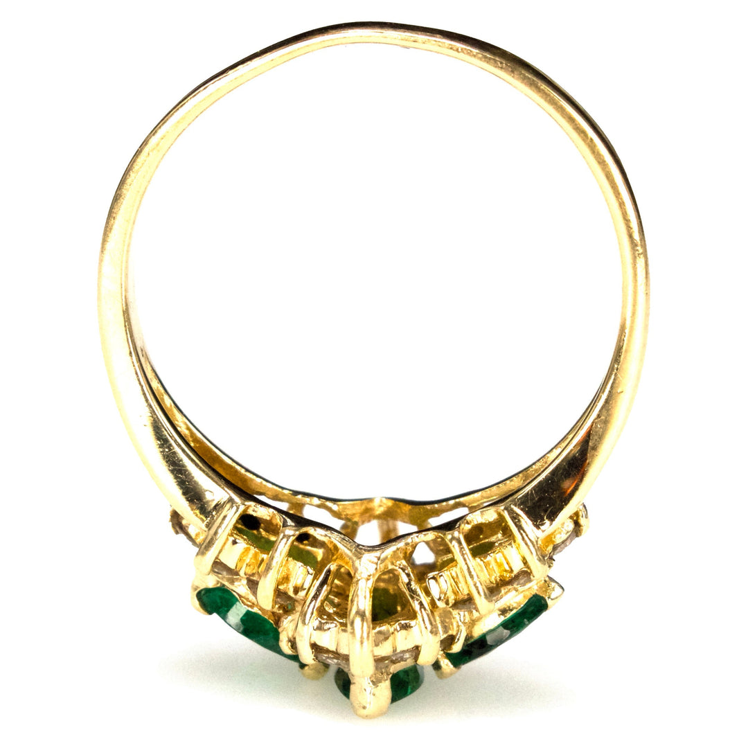 Vintage Three Stone Marquise Cut Emerald Ring with Diamond Surround in Gold