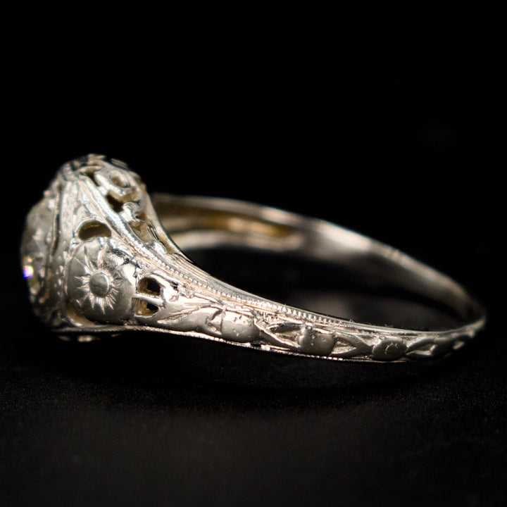 18K White Gold Art Deco 0.59 Carat European Cut Diamond Filigreed Solitaire with Floral Motif