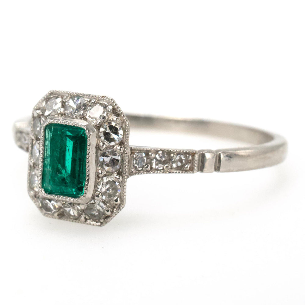 Petite Edwardian Style Emerald and Diamond Halo Ring in Platinum