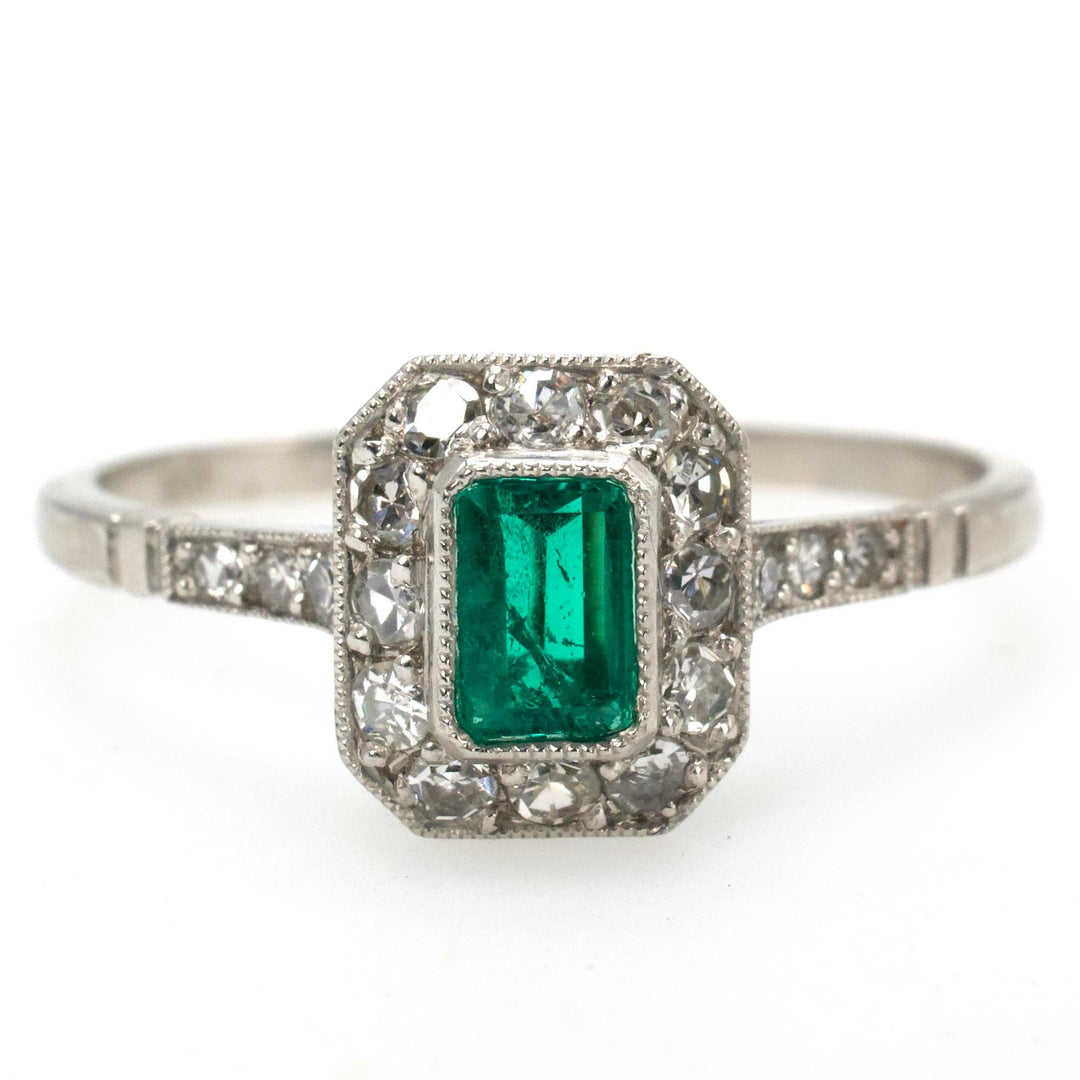 Petite Edwardian Style Emerald and Diamond Halo Ring in Platinum