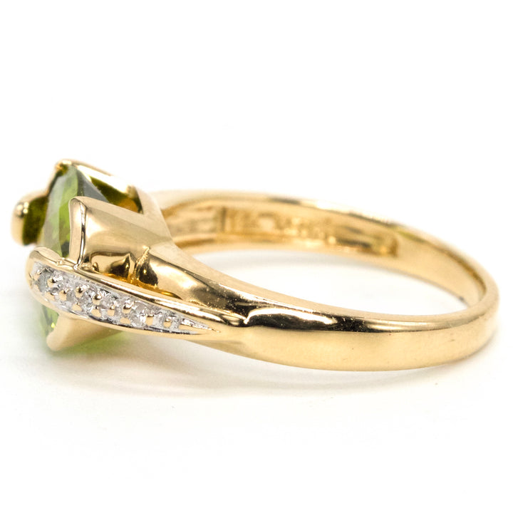 Oval Vivid Green Peridot Set East-West in 14K Yellow Gold Setting with Diamonds