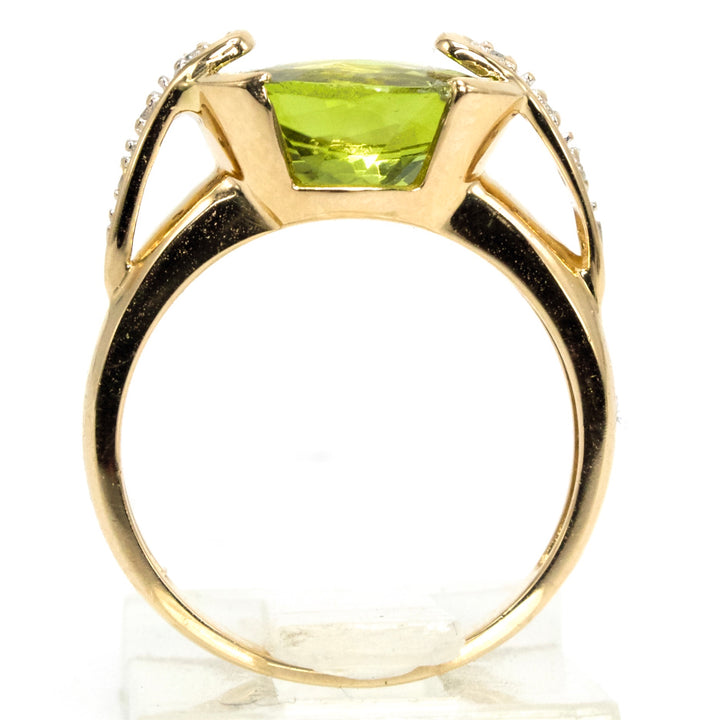 Oval Vivid Green Peridot Set East-West in 14K Yellow Gold Setting with Diamonds