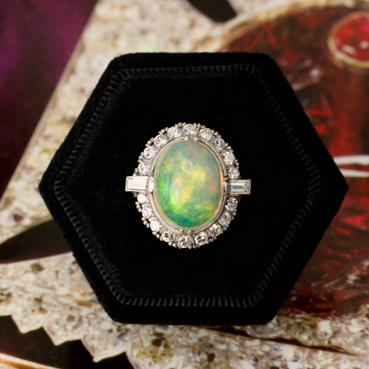 GIA Certified Natural 5.40 Carat Oval Opal and Diamond Halo Ring in Platinum