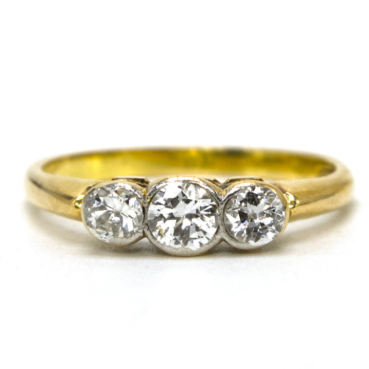 Dainty Three Stone Transitional Cut Diamond Ring in 18K Yellow Gold and Platinum