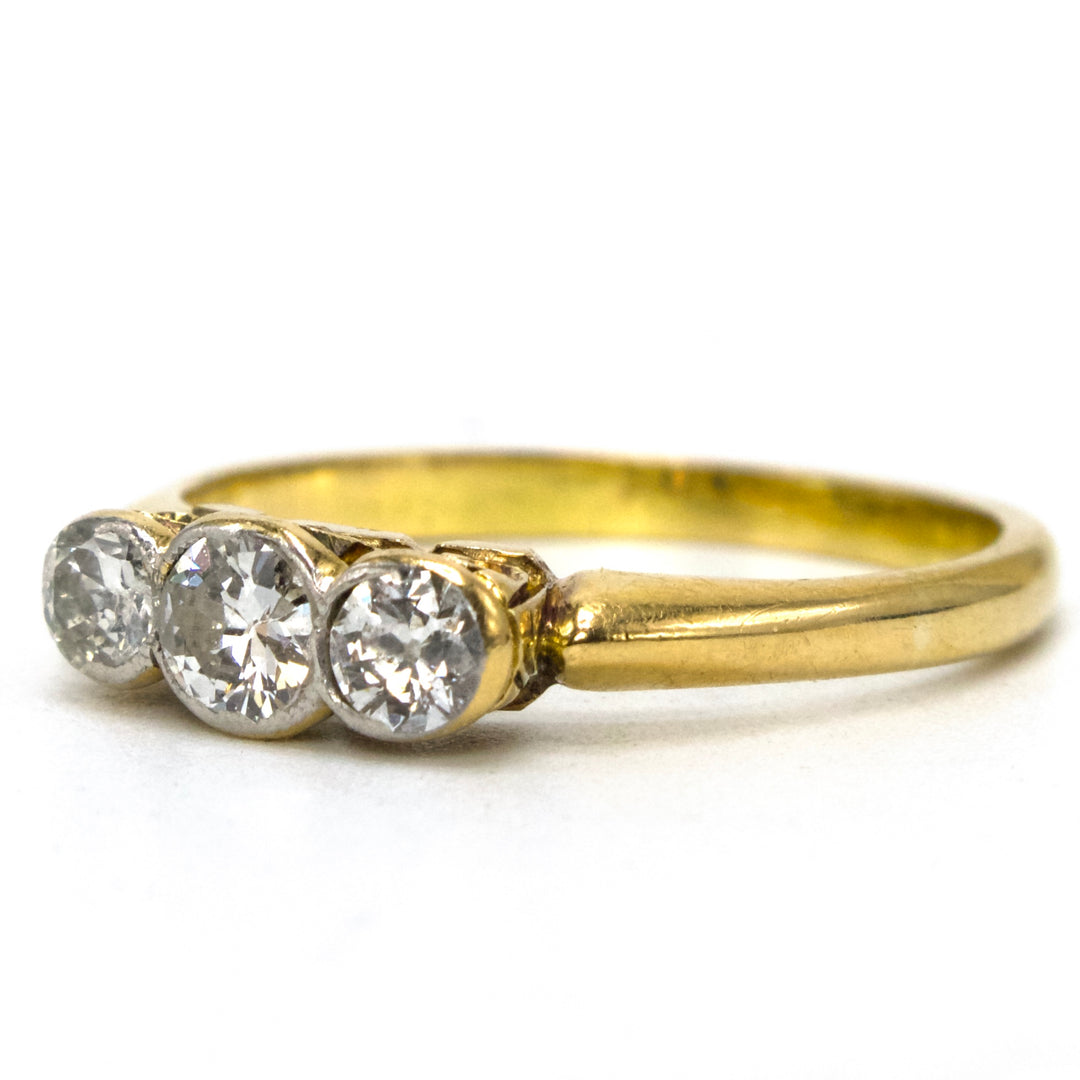 Dainty Three Stone Transitional Cut Diamond Ring in 18K Yellow Gold and Platinum