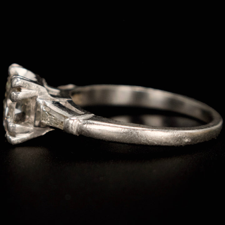 Vintage 1.25 Carat Diamond Solitaire with Tapered Baguette Diamonds in Platinum