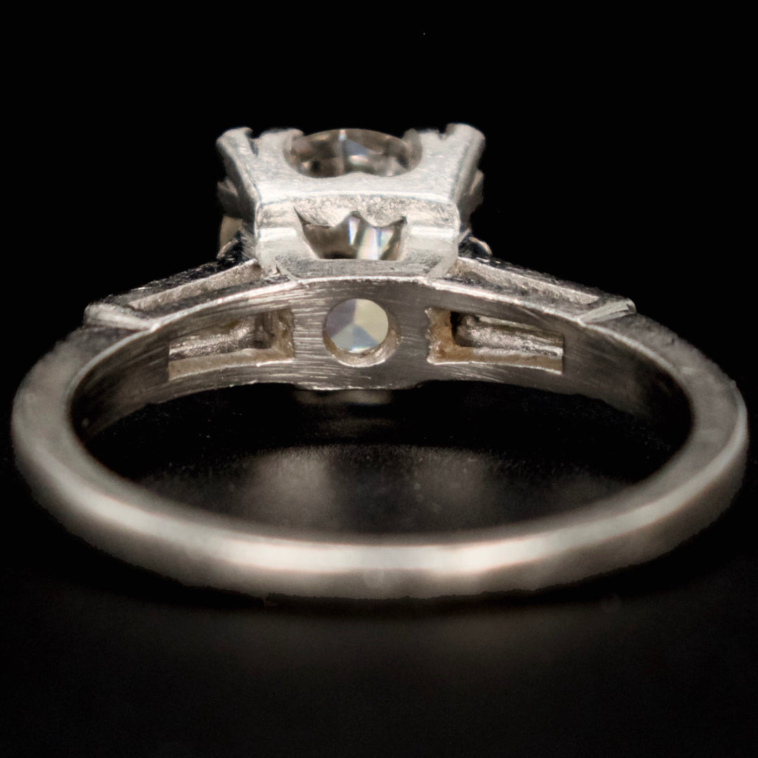 Vintage 1.25 Carat Diamond Solitaire with Tapered Baguette Diamonds in Platinum