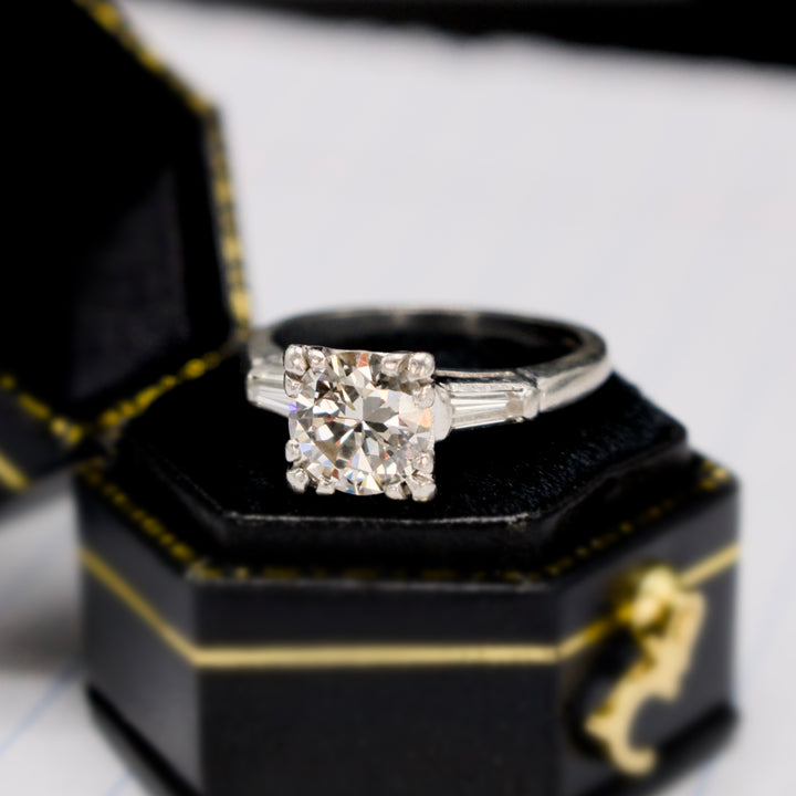 Vintage 1.25 Carat Diamond Solitaire with Tapered Baguette Diamonds in Platinum