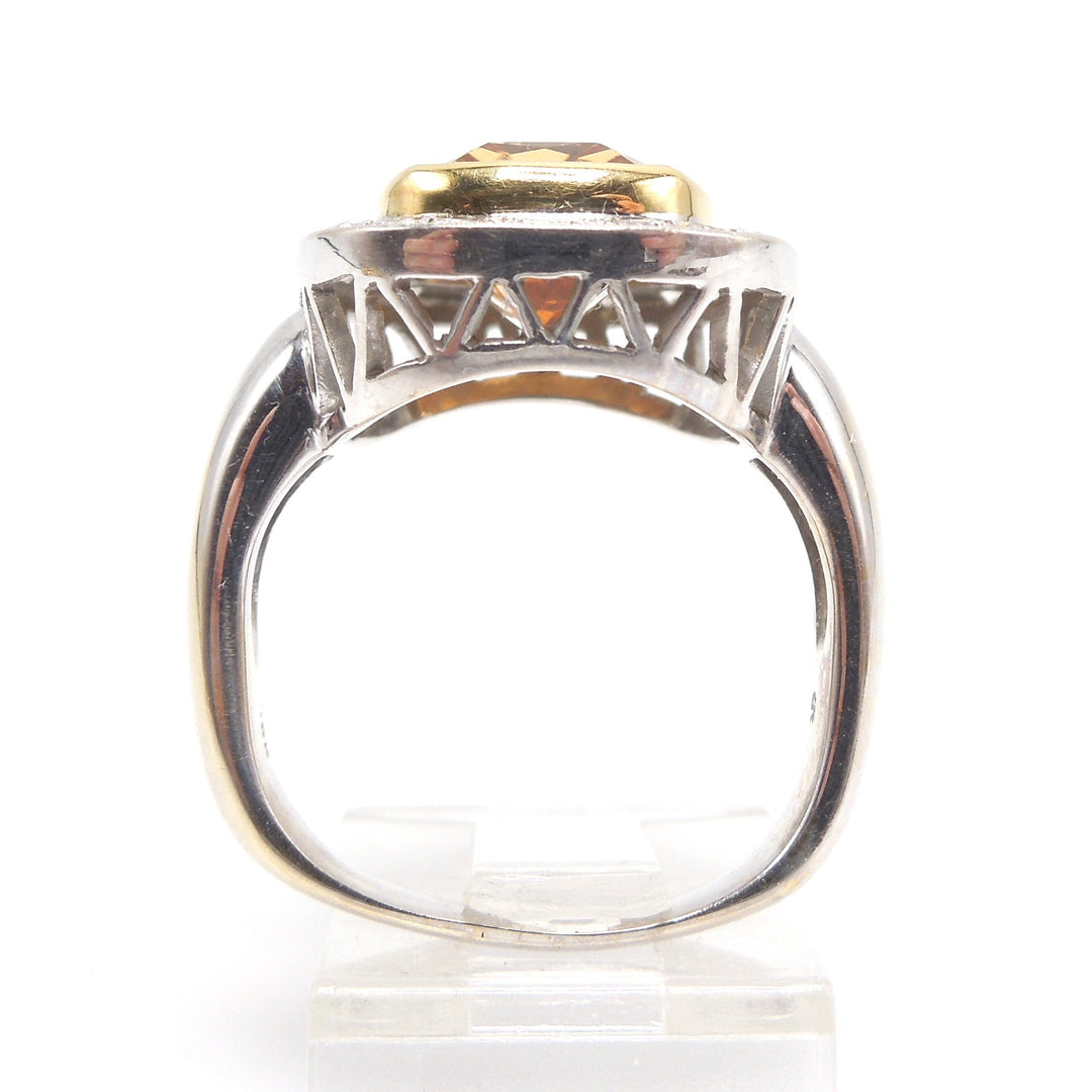 Approximately 6.00 Carat Precious Topaz Ring with Diamond Halo in 18K