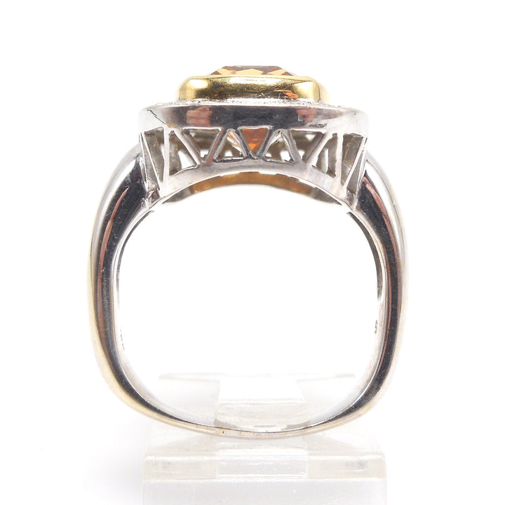 Approximately 6.00 Carat Precious Topaz Ring with Diamond Halo in 18K