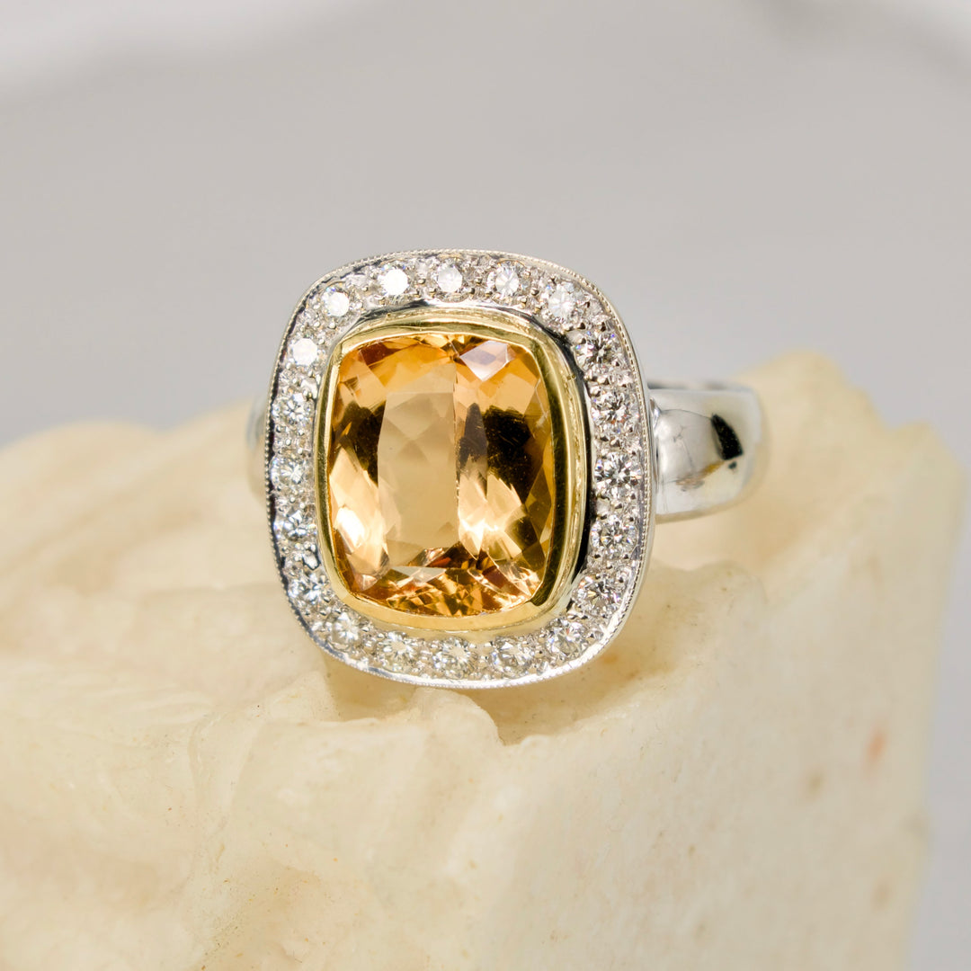 Approximately 6.00 Carat Precious Topaz Ring with Diamond Halo in 18K