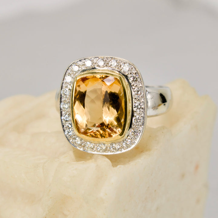 Approximately 6.00 Carat Precious Topaz Ring with Diamond Halo in 18K