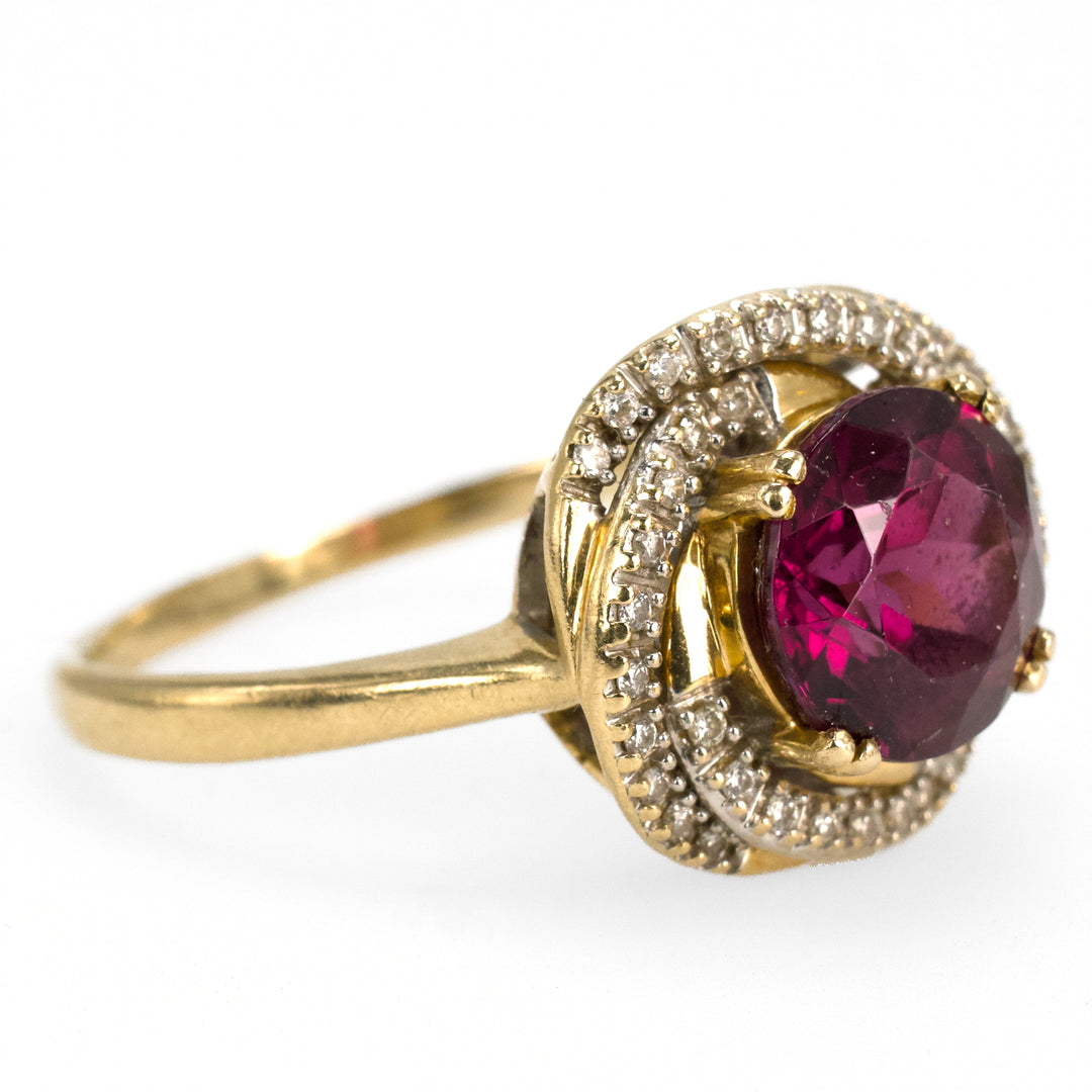 Purplish Red Rhodolite Garnet Ring with Diamond Spiral Surround