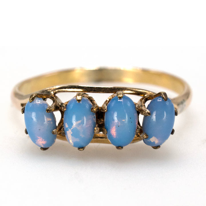 Victorian Yellow Gold Ring with 4 Oval Blue Opals