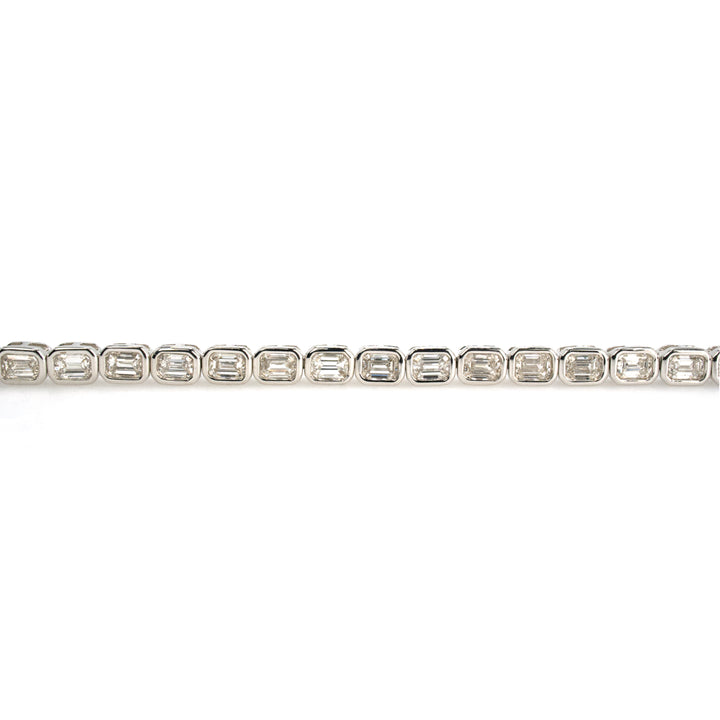 18K White Gold Tennis Bracelet with 4.95 Carats of Natural Emerald Cut Diamonds in Bezels