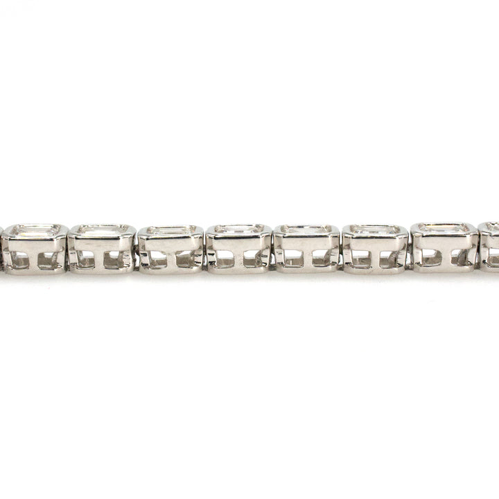 18K White Gold Tennis Bracelet with 4.95 Carats of Natural Emerald Cut Diamonds in Bezels