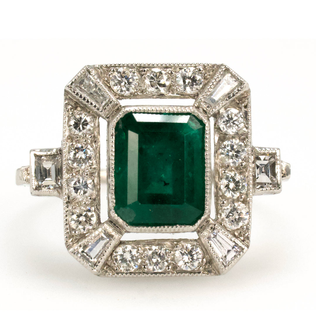 Estate 1.40 Carat Emerald Cut Emerald in Art Deco Style White Gold Setting with Diamond Halo