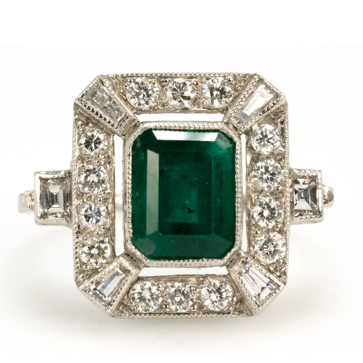 Estate 1.40 Carat Emerald Cut Emerald in Art Deco Style White Gold Setting with Diamond Halo