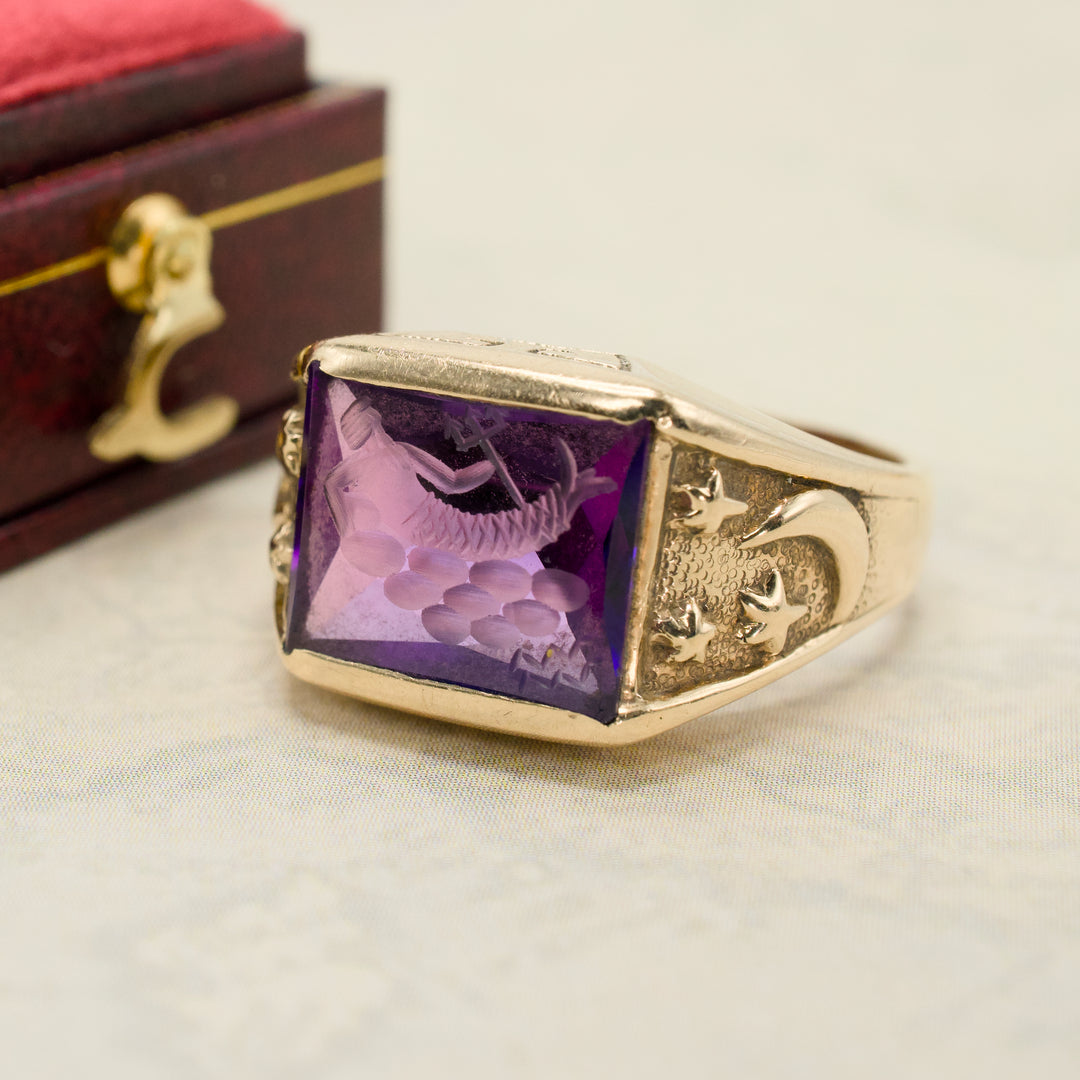 Neoclassical 1930s Gold Gents Ring with Purple Sapphire Intaglio of Triton