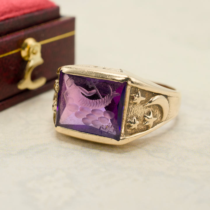 Neoclassical 1930s Gold Gents Ring with Purple Sapphire Intaglio of Triton