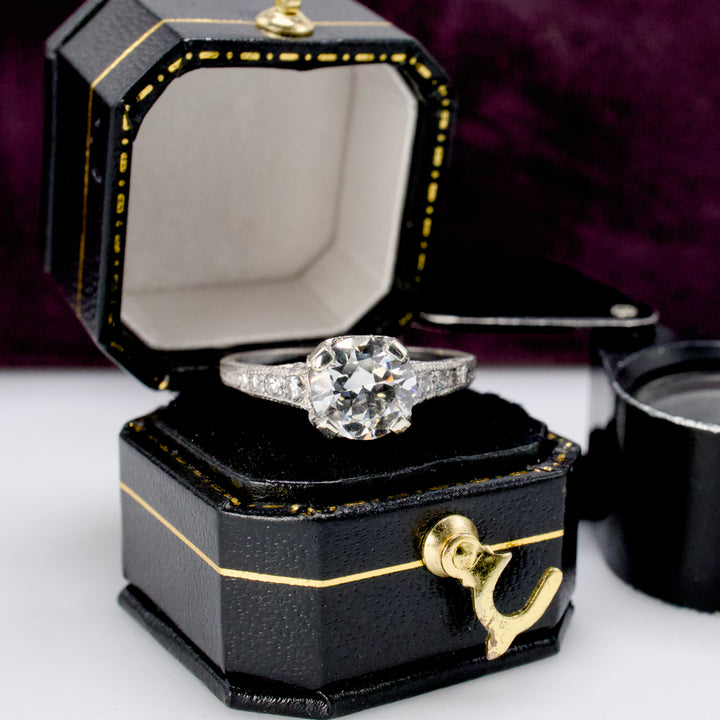 Art Deco Diamond Accented Platinum Solitaire with 1.20 Carat Transition Cut Diamond