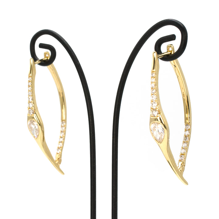 Elongated Diamond Hoop Earrings in Yellow Gold with Pear and Peekaboo Diamonds