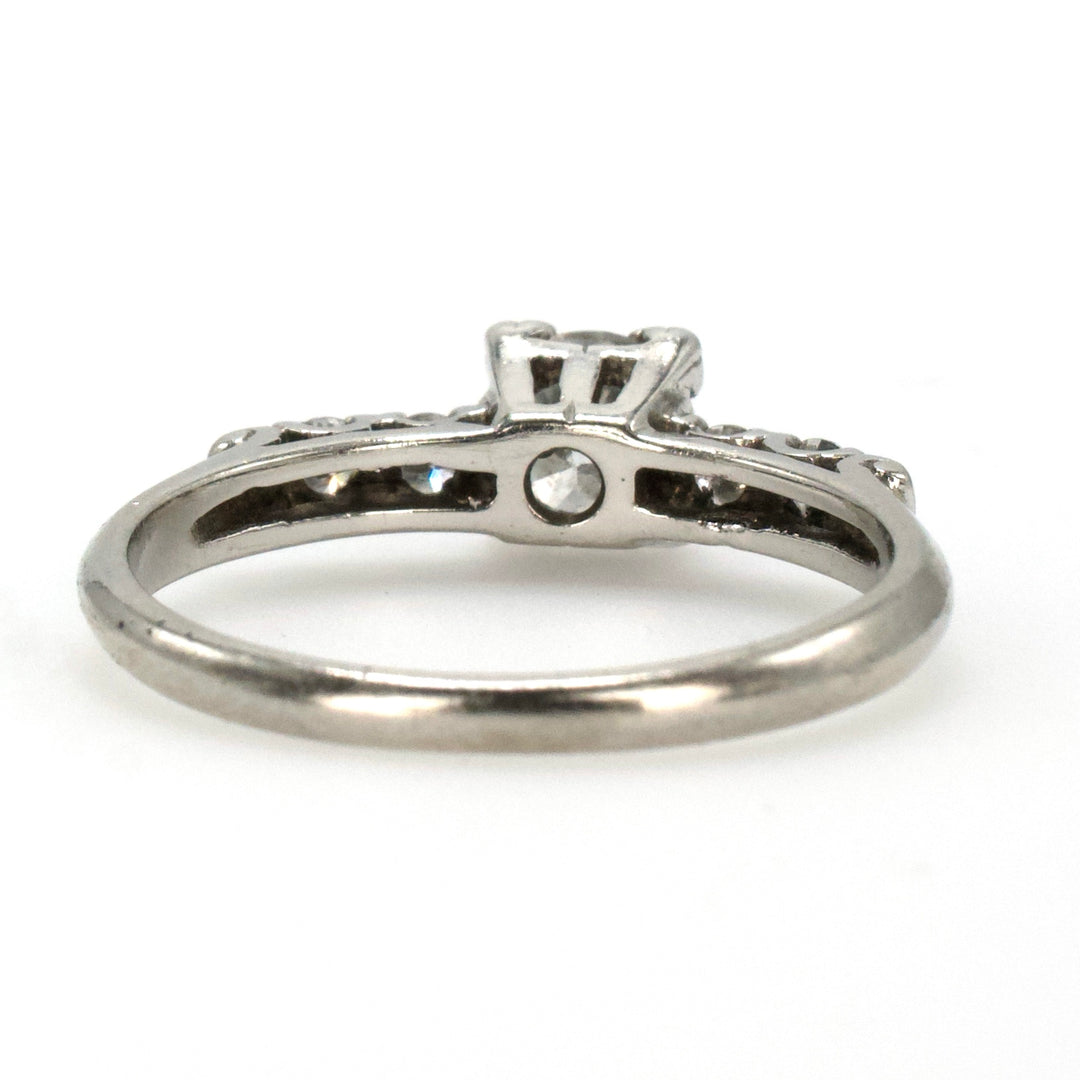 Midcentury Platinum Diamond Engagement Ring with Transitional Cut Diamond and Four Accent Diamonds