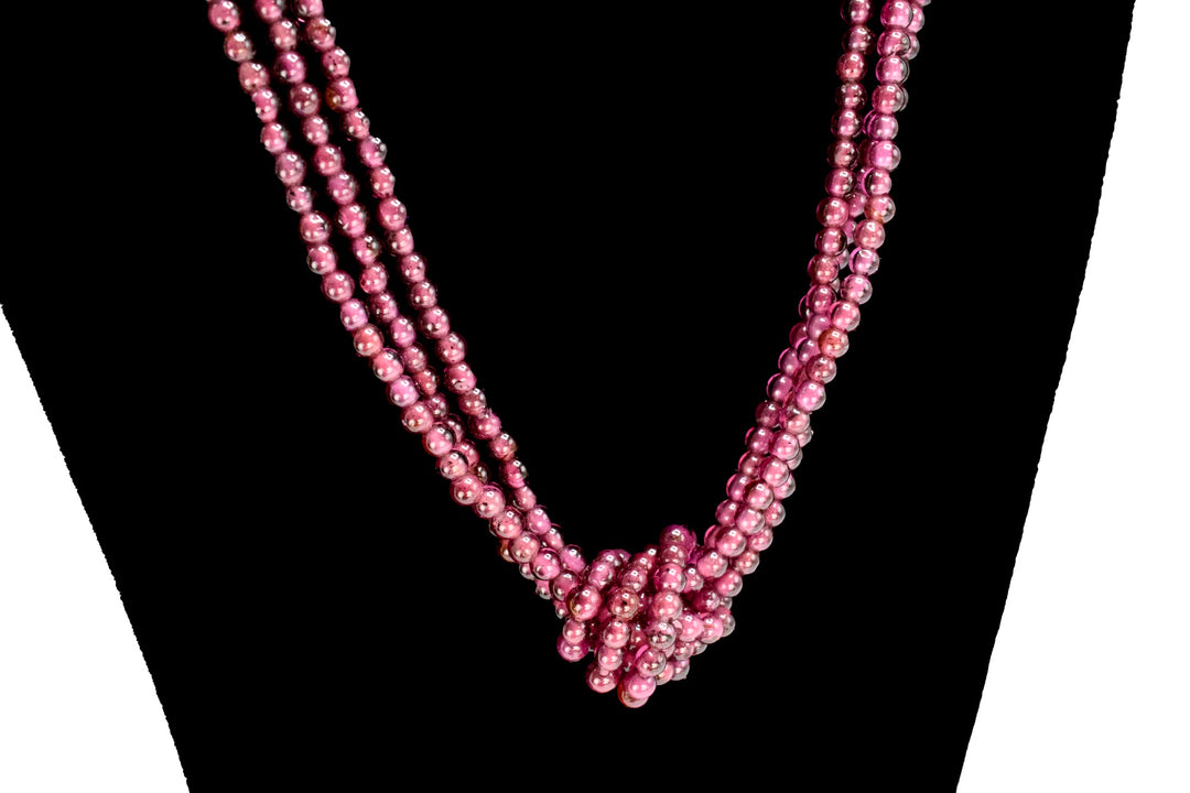 Knotted Triple Strand Necklace of Sterling Silver and Rubellite Tourmaline Beads