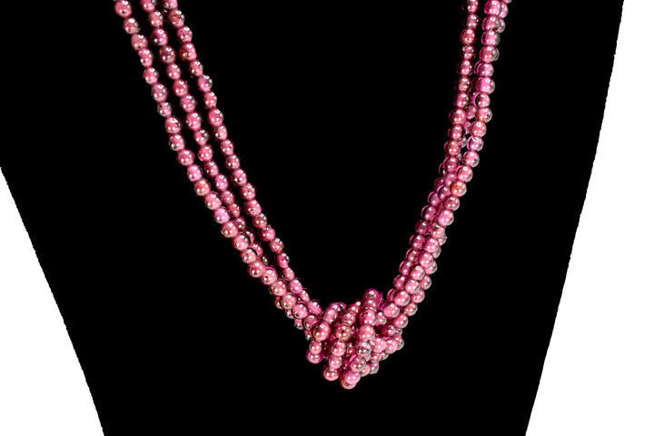 Knotted Triple Strand Necklace of Sterling Silver and Rubellite Tourmaline Beads