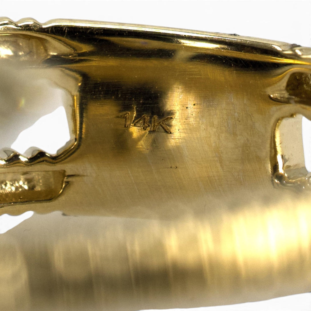 Gold Ribbed Spiral Ring with Pear-Shaped Diamonds
