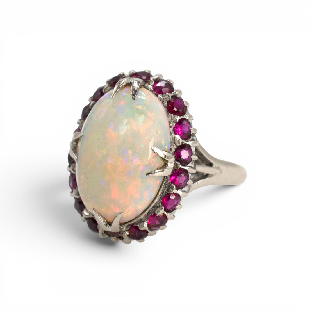 Large Oval Opal and Ruby Halo Ring in White Gold