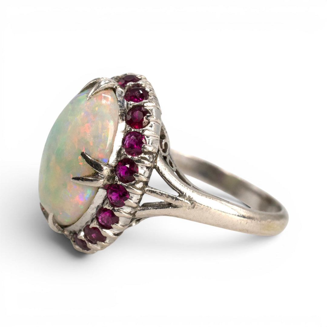 Large Oval Opal and Ruby Halo Ring in White Gold