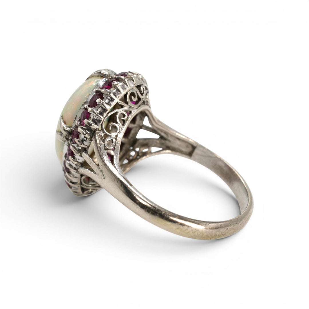 Large Oval Opal and Ruby Halo Ring in White Gold
