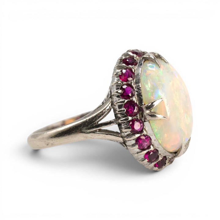 Large Oval Opal and Ruby Halo Ring in White Gold