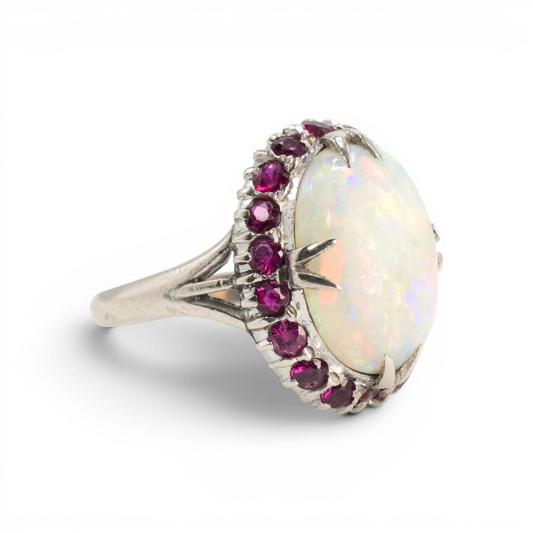 Large Oval Opal and Ruby Halo Ring in White Gold