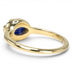 1.54 Carat Oval Blue Sapphire in East-West Belcher Inspired Gold Ring