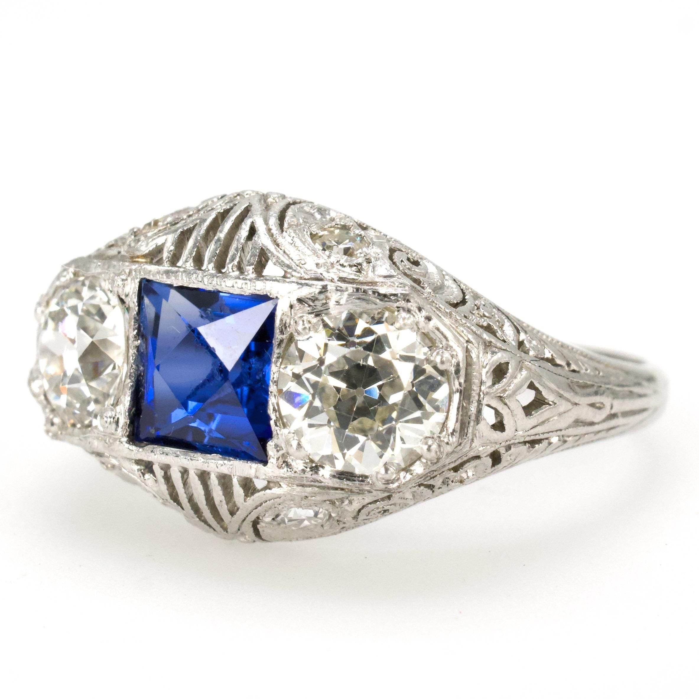 Edwardian Three Stone Platinum Filigree Ring with European Cut