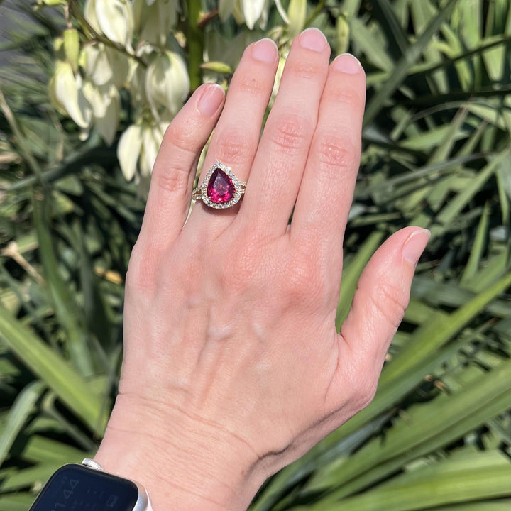 6.37 ct Pear Cut Rubellite Tourmaline Ring with Diamond Halo and Split Shank
