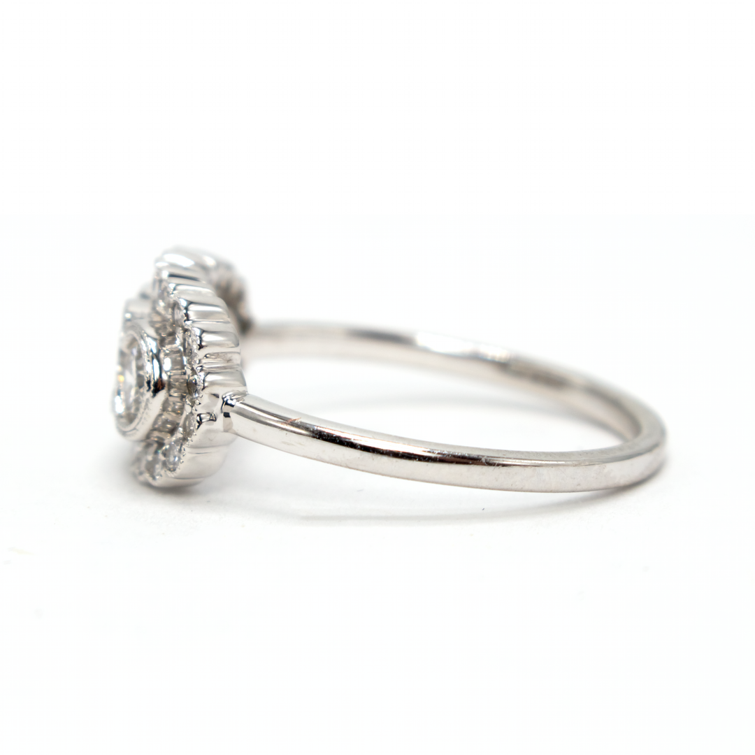 Vintage Style Three Stone Diamond Engagement Ring with Diamond Surround