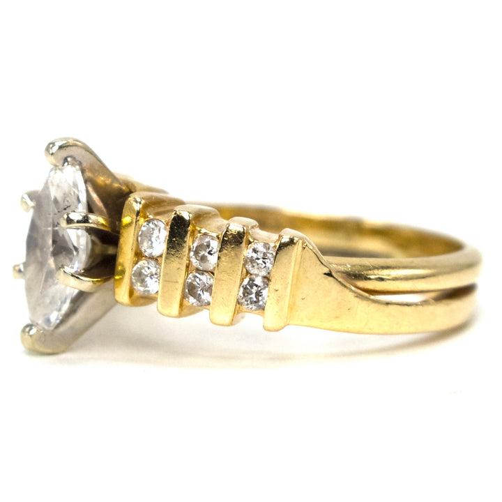 0.77 Carat Marquise Cut Diamond Ring with Channel Set Accent Diamonds in Gold