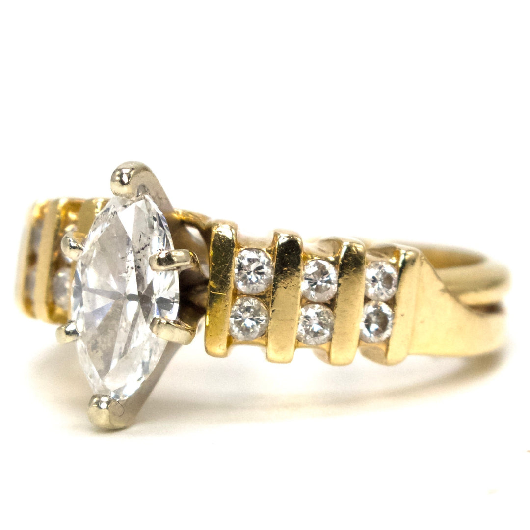 0.77 Carat Marquise Cut Diamond Ring with Channel Set Accent Diamonds in Gold