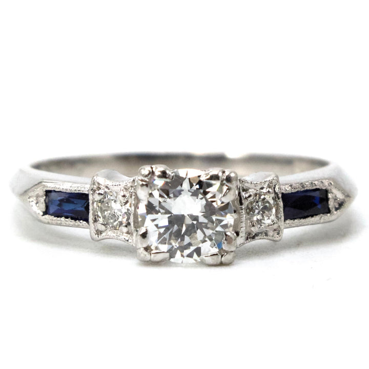 0.38 Carat Transitional Cut Diamond Solitaire with Baguette Sapphire Accents in Platinum