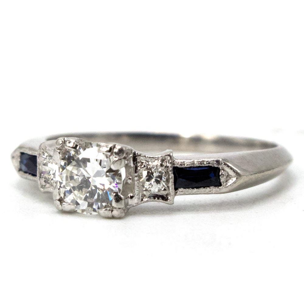 0.38 Carat Transitional Cut Diamond Solitaire with Baguette Sapphire Accents in Platinum