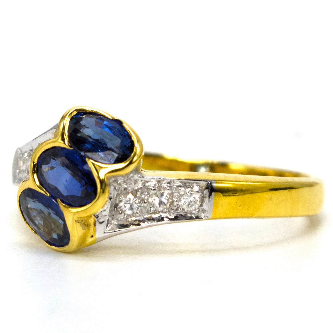 Estate Three Stone Bypass Ring with Sapphires and Diamonds in 18K Gold