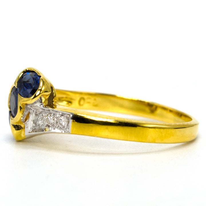 Estate Three Stone Bypass Ring with Sapphires and Diamonds in 18K Gold