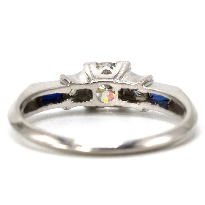 0.38 Carat Transitional Cut Diamond Solitaire with Baguette Sapphire Accents in Platinum