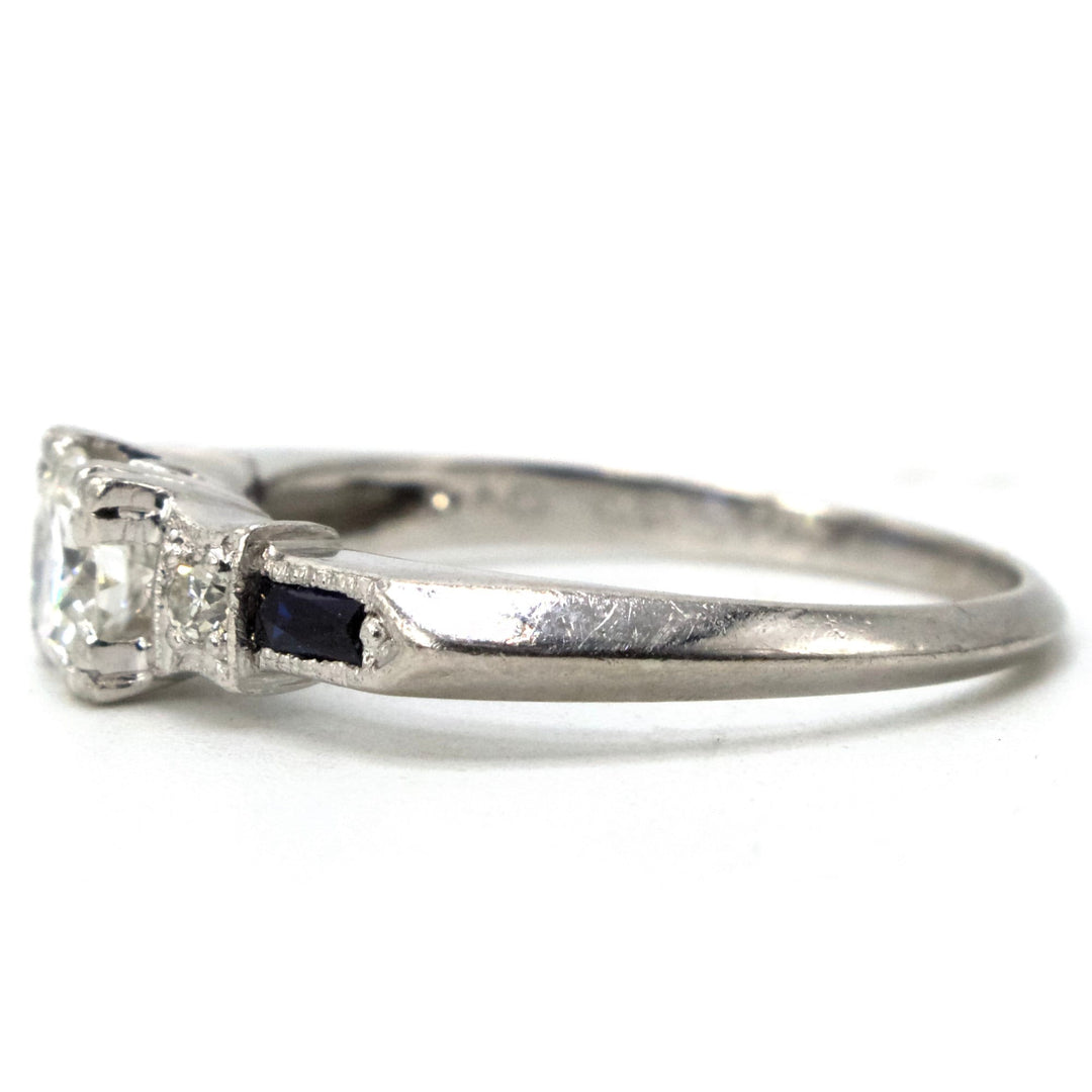 0.38 Carat Transitional Cut Diamond Solitaire with Baguette Sapphire Accents in Platinum