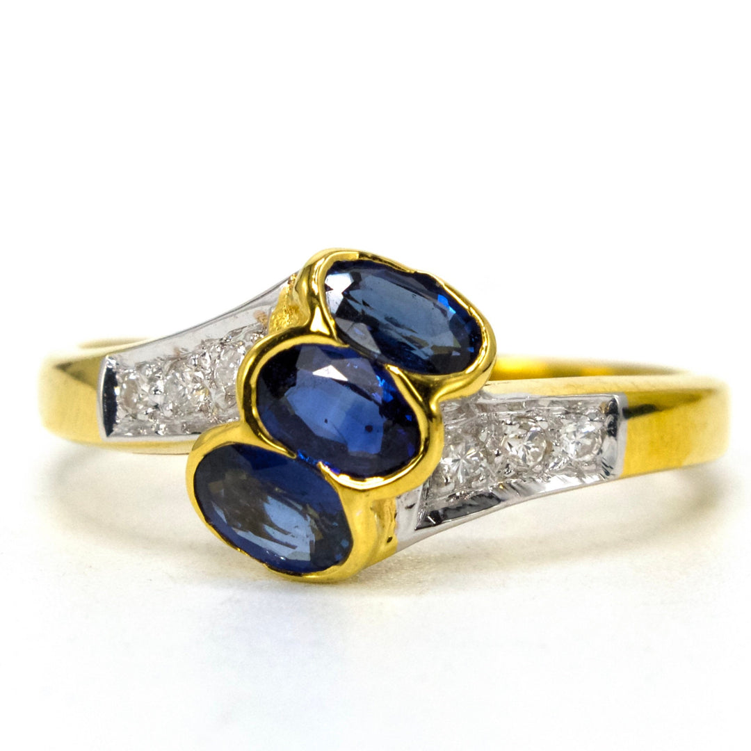 Estate Three Stone Bypass Ring with Sapphires and Diamonds in 18K Gold