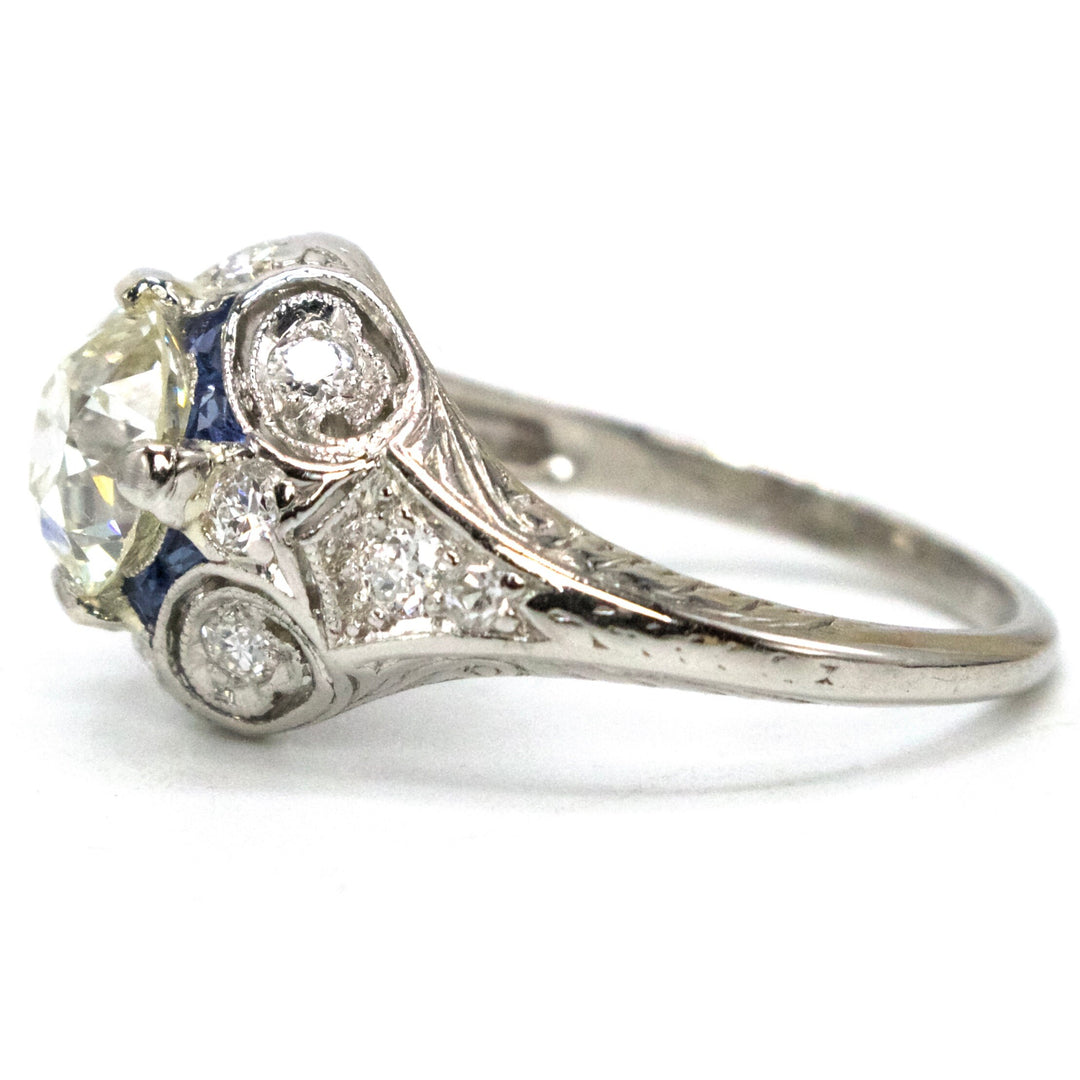 Art Deco Platinum Engagement Ring with 1.34 Carat Old European Cut Diamond and Accent Sapphires