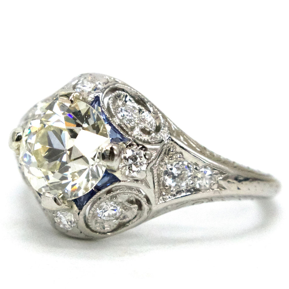 Art Deco Platinum Engagement Ring with 1.34 Carat Old European Cut Diamond and Accent Sapphires